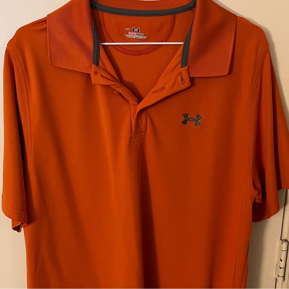 Men’s orange Uber Armour medium heat gear polo